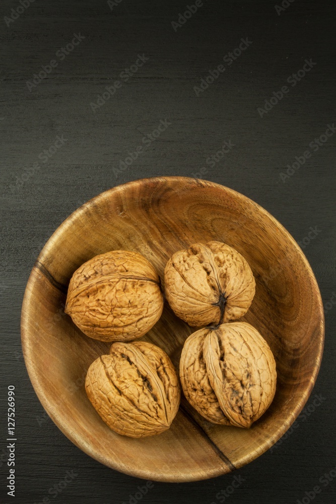 Super foods for human brain. Nuts on a wooden table. Walnuts
Super foods for human brain. Nuts on a wooden table. Walnuts