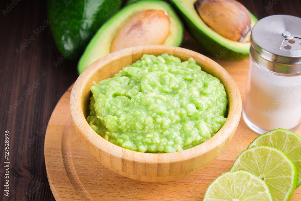 avocado Guacamole on molcajete real Mexican traditional procedur avocado Guacamole on molcajete real Mexican traditional procedur