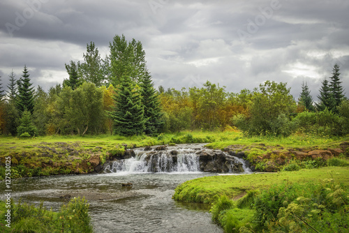 Wonderful waterfal in Iceland in Autumn colors