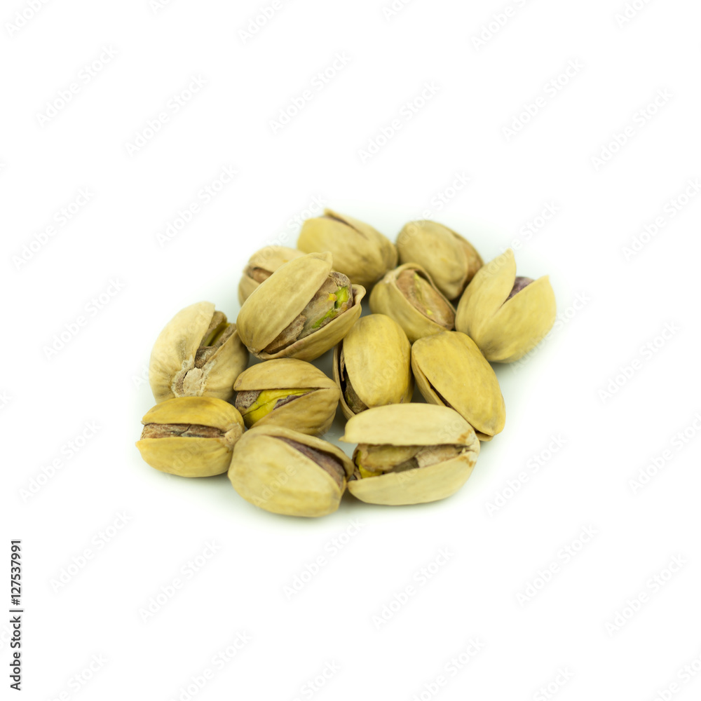 Pistachio nuts. Isolated on a white background. Pistachio nuts. Isolated on a white background.