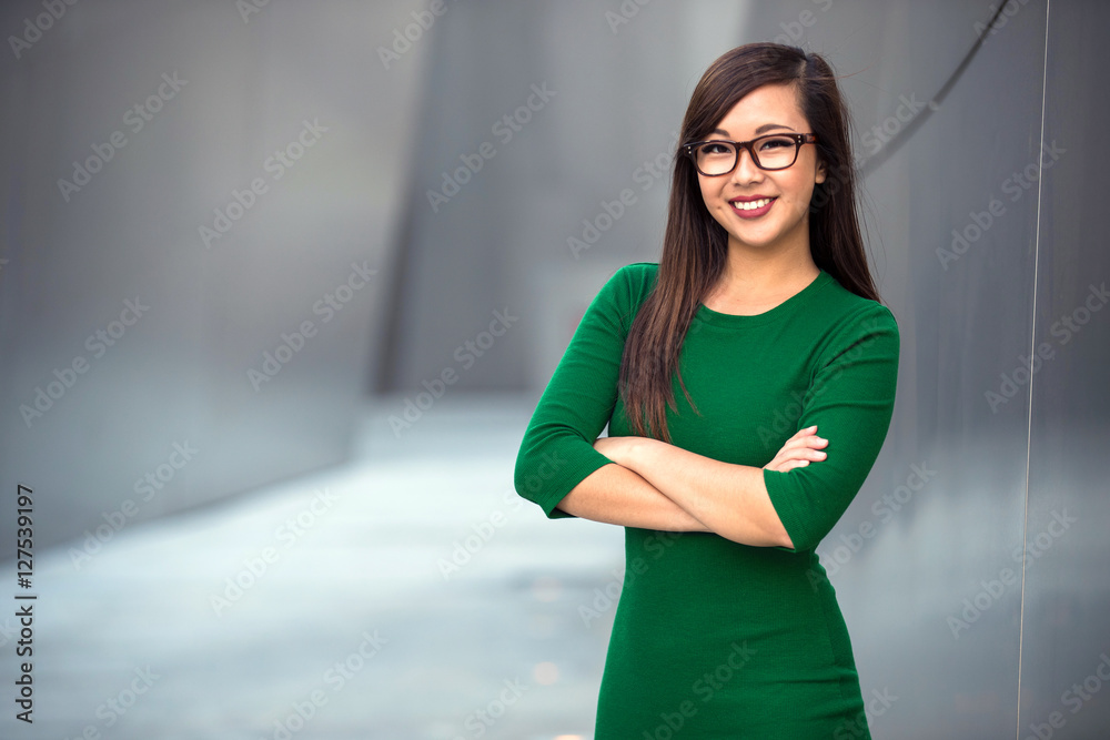 Ti år Downtown kaos Portrait of a young professional business woman staff leader confident with  arms folded Stock-foto | Adobe Stock