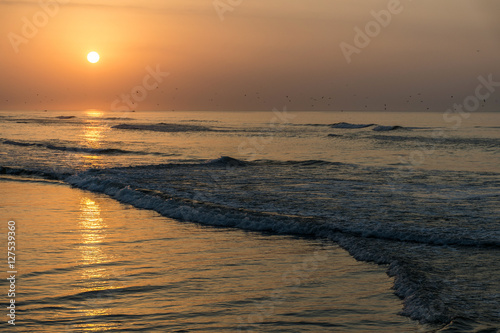 Amazing Sunset red waves at beach Salalah Oman 8