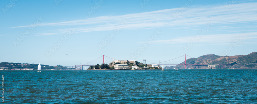 Alcatraz island seen through Golden Gate Bridge