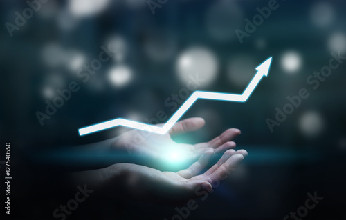 Принти на полотні Businesswoman holding digital arrow 3D rendering