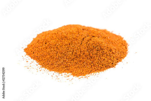 Pile of cayenne pepper isolated on white background