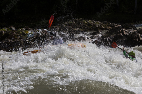 Kayak in whitewater photo