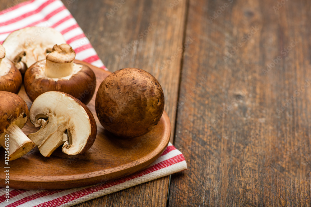 Mushrooms on a rustic wooden table. Copyspace. Mushrooms on a rustic wooden table. Copyspace.