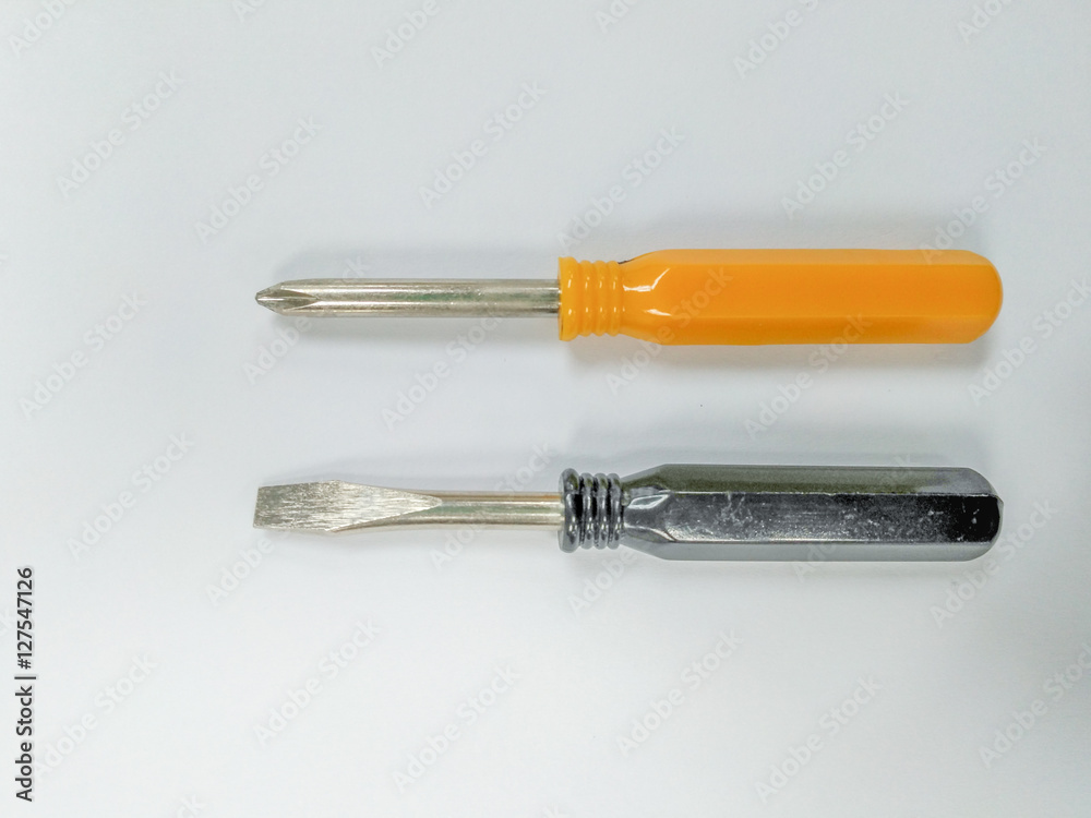 Two screwdrivers on a white background. Two screwdrivers on a white background.