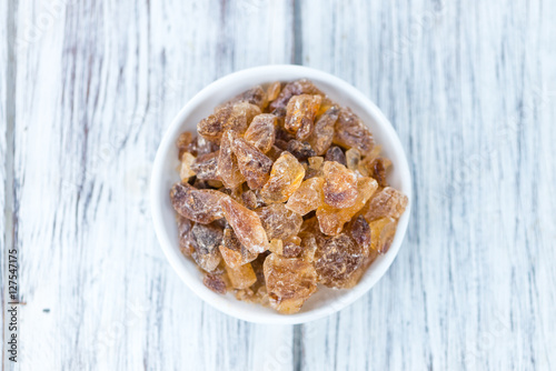 Brown Rock Candy on wooden background