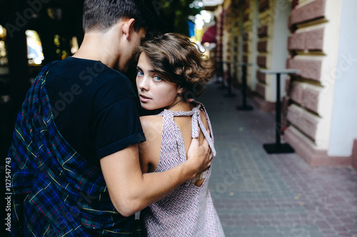 couple hugging in the street