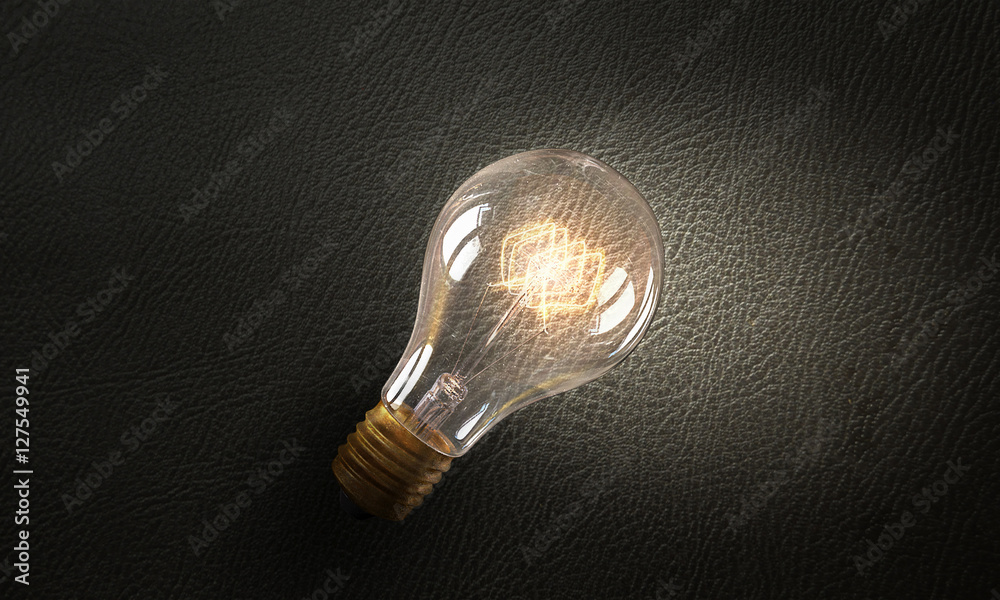 Electric bulb on texture . Mixed media Electric bulb on texture . Mixed media