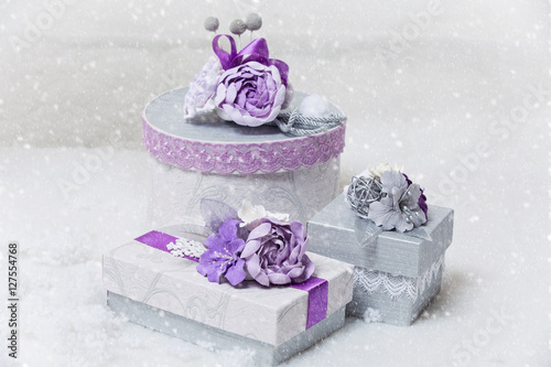 Set of flower decorated present boxes photo
