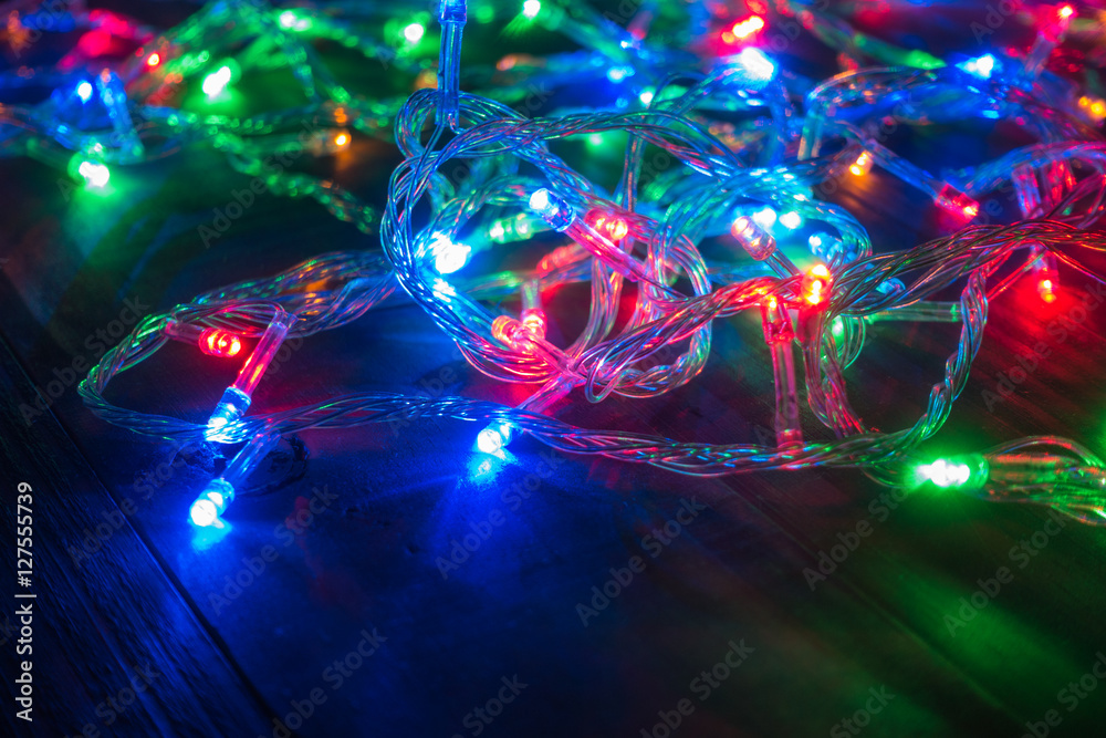 Colorful flash lights on wooden background Colorful flash lights on wooden background