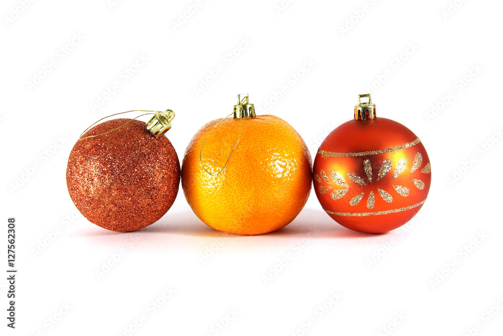 mandarins and Christmas decorations close-up on a white backgrou mandarins and Christmas decorations close-up on a white backgrou