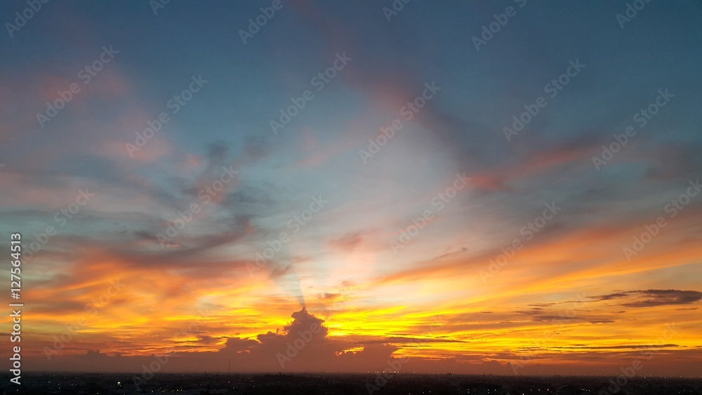 Fototapeta premium The Sun shine reflect the orange sky.