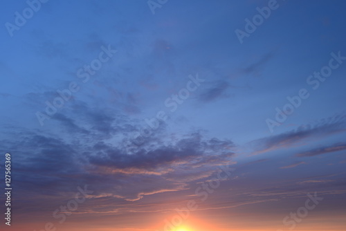 Azure blue sky in the light of sunset