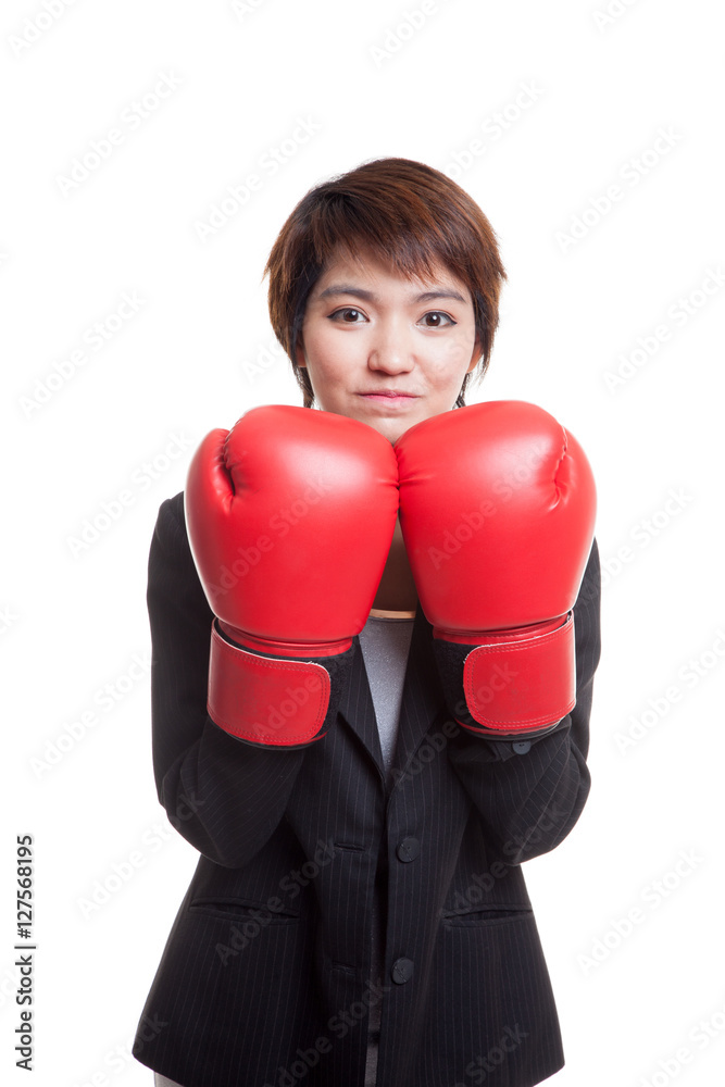 Young Asian business woman with red boxing gloves. Young Asian business woman with red boxing gloves.