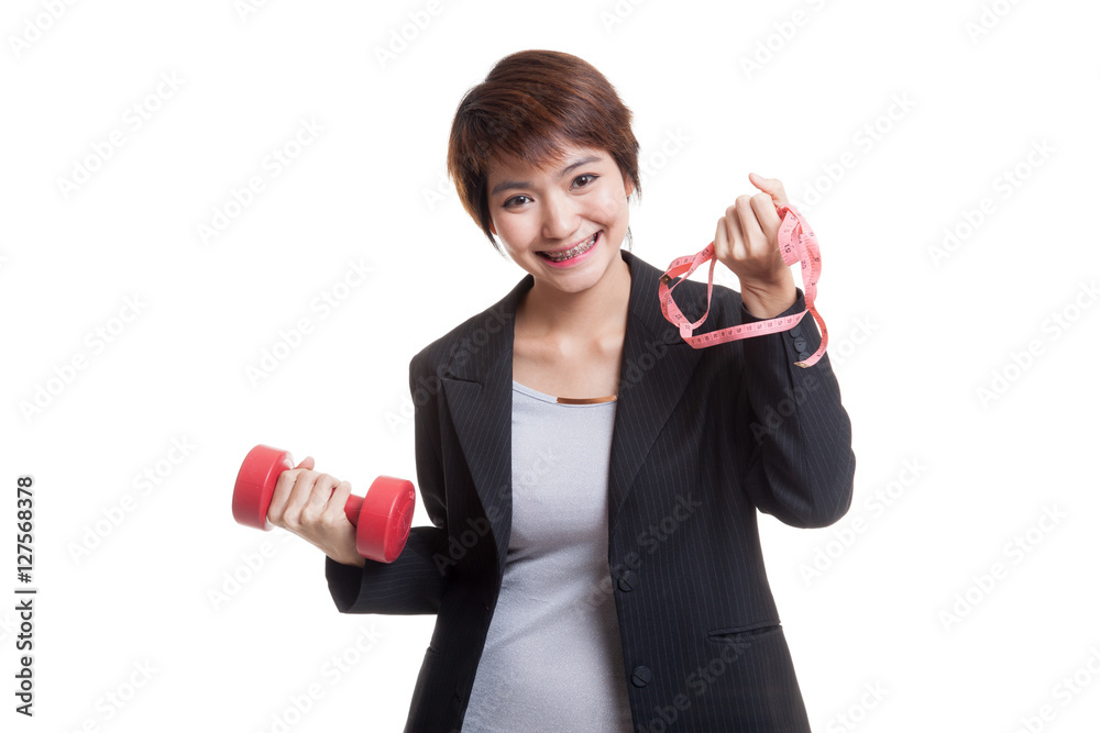 Healthy Asian business woman with dumbbells and measuring tape. Healthy Asian business woman with dumbbells and measuring tape.