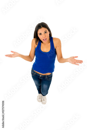  hispanic woman shrinking shoulders open arms wondering confused in doubt