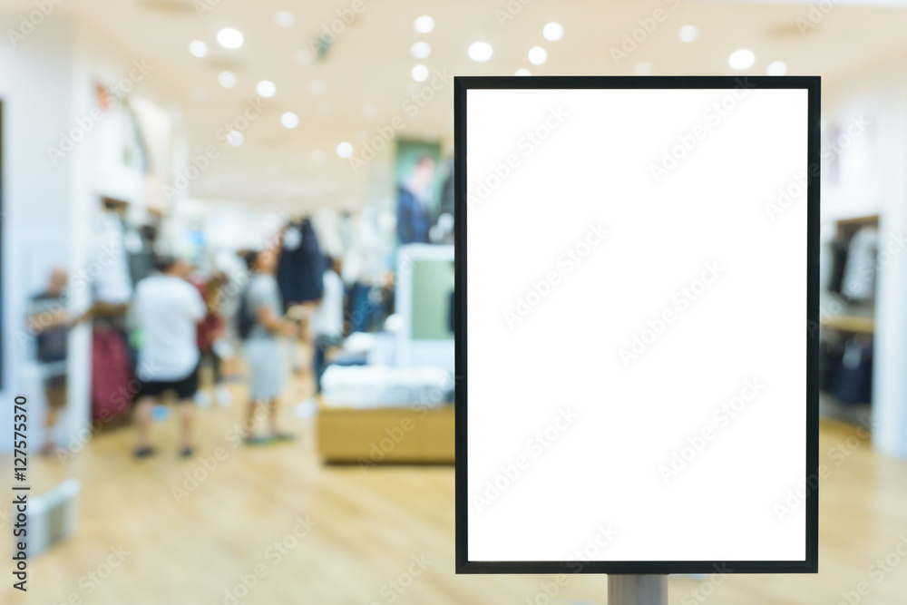 Blank sign with copy space for your text message or mock up content in modern shopping mall. Blank sign with copy space for your text message or mock up content in modern shopping mall.
