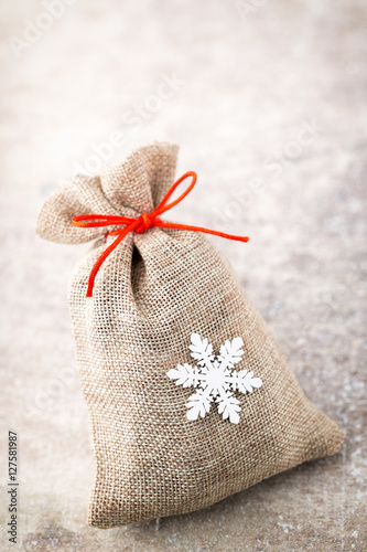 Christmas gard. Gift bag with burlap. Christmas decoration.