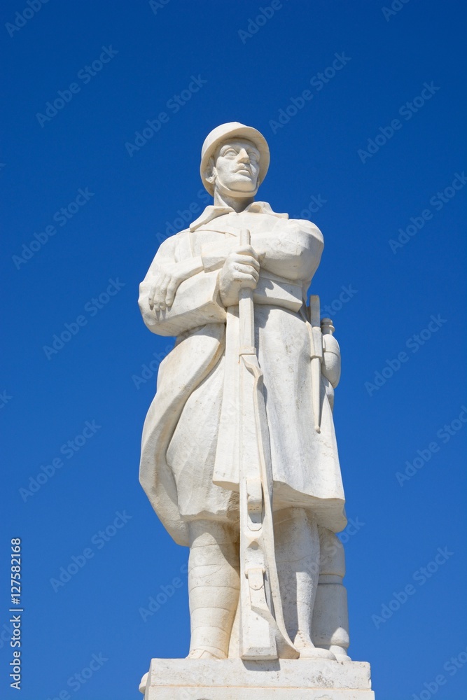 Statue to the unknown soldier in Agia Stratiota Square (Agnostou Square), Rethymno, Crete, Greece.