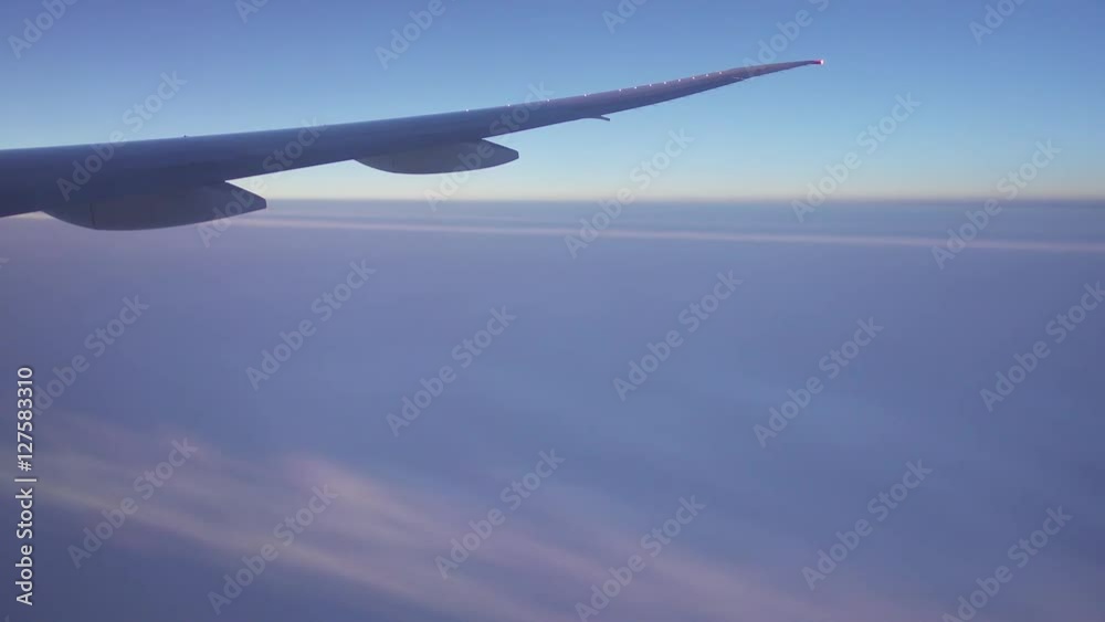 looking on wing and fumes of flying airplane, 4k
looking on wing and fumes of flying airplane, 4k