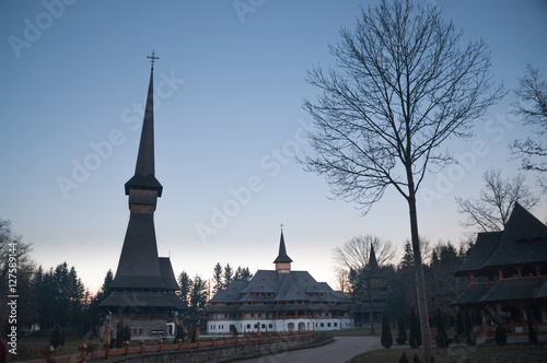 Wooden Monastery in the north of Transylvania at dawn