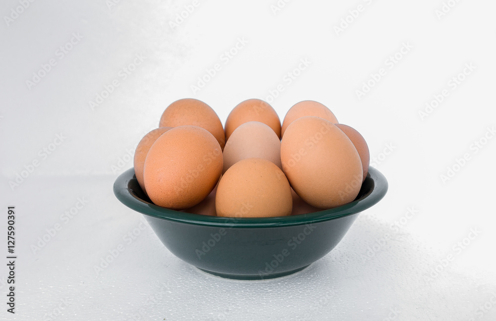 eggs in a cup on a white background eggs in a cup on a white background