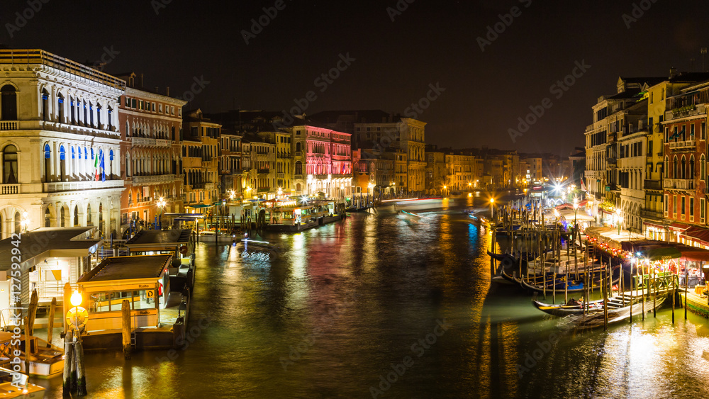 View from the Rialto bridge by night in Venice Italy