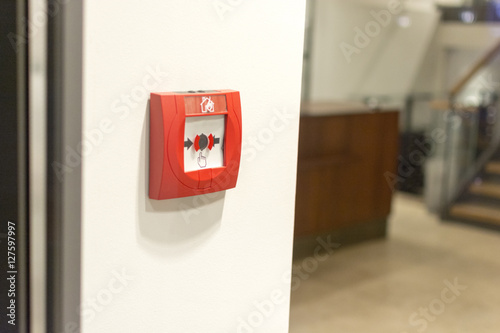 fire alarm on the wall of shopping center.