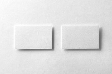 Corporate stationery set mockup at white textured paper background.