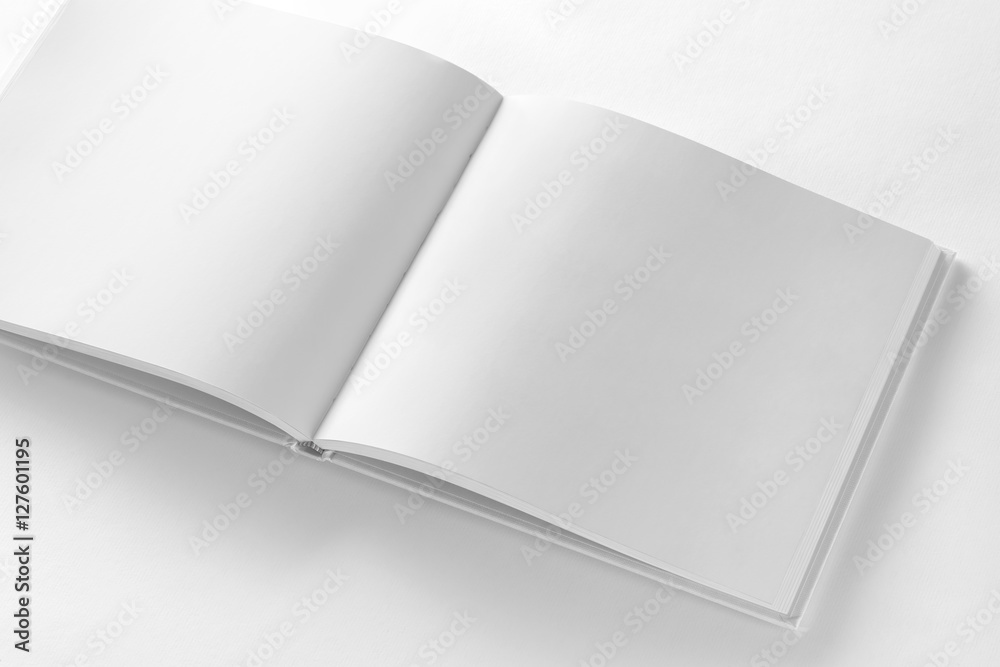 Obraz premium Mockup of opened blank square book at white paper background