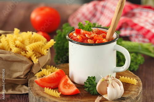 Tomato sauce with ingredients for pasta