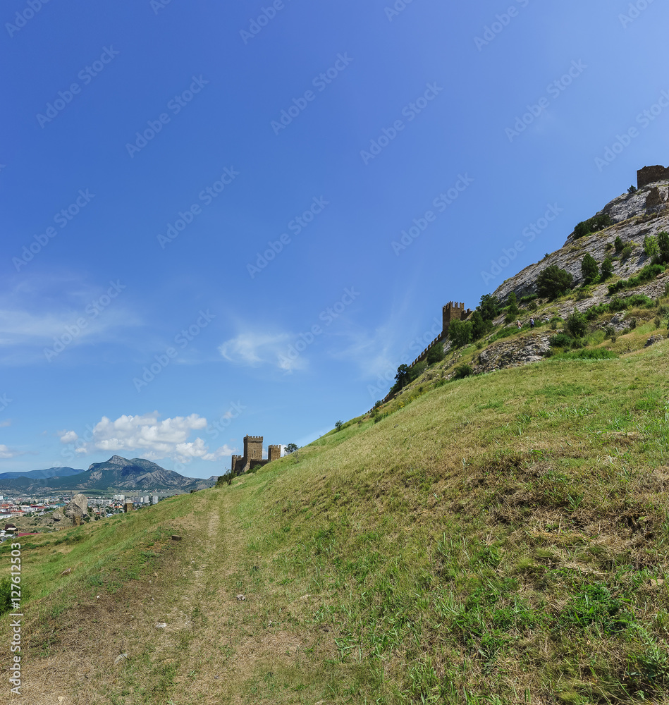 Trail along the fortress wall to the consular castle of the Genoese fortress. Sudak, Crimea, Russia Trail along the fortress wall to the consular castle of the Genoese fortress. Sudak, Crimea, Russia