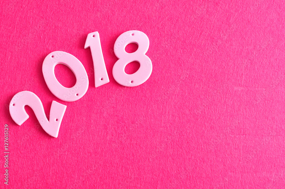 2018 in pink numbers isolated against a pink background