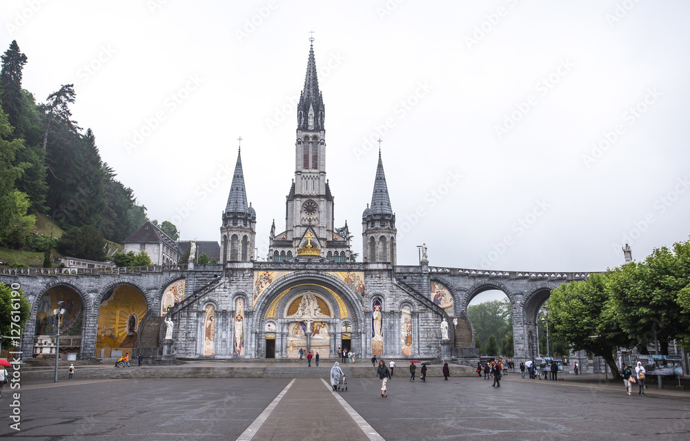 LOURDES, FRANCE - JUNE 10, 2016: Notre Dame du Rosaire de Lourdes (Basilica of our Lady of the Rosary) the roman Catholic church in Lourdes, France, in June 10, 2016