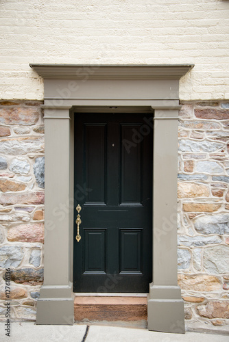Old wooden door in Colonial architecture