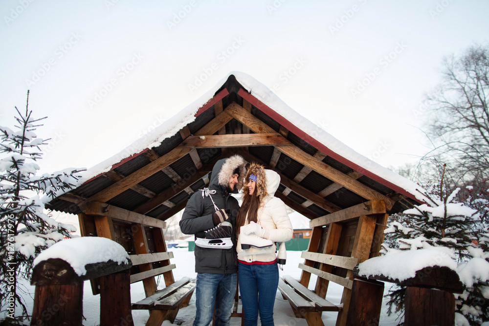 Winter couple in love, cold weather and warm clothes Winter couple in love, cold weather and warm clothes