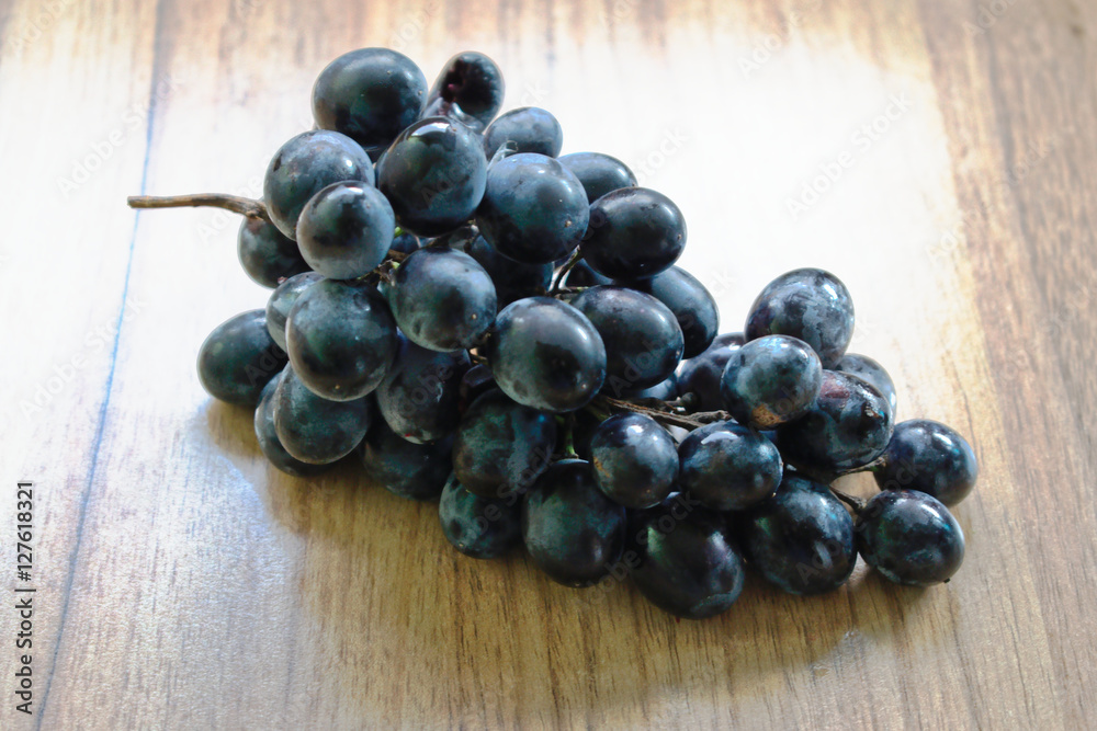 Grapes on a wooden table