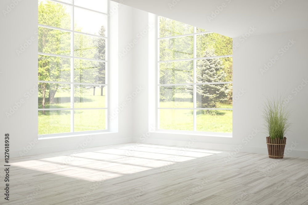 White empty room with green landscape in window. Scandinavian interior design White empty room with green landscape in window. Scandinavian interior design
