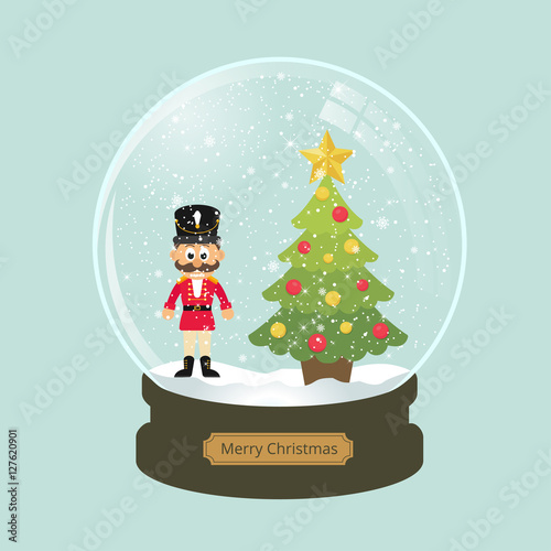 christmas snowglobe with fir tree and cartoon nutcracker