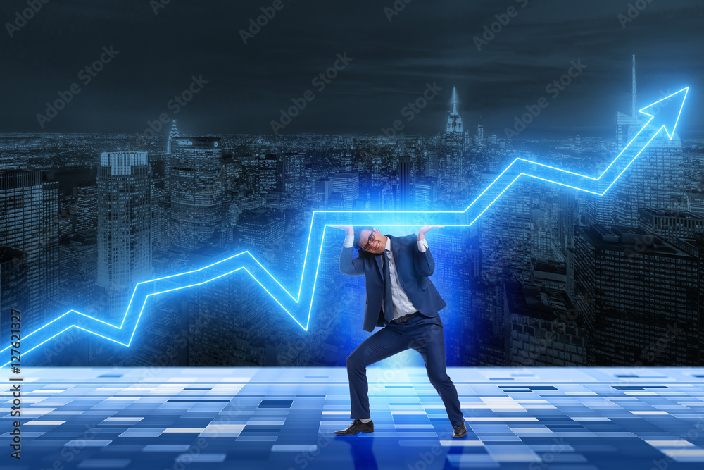 Businessman supporting increase in economy Businessman supporting increase in economy