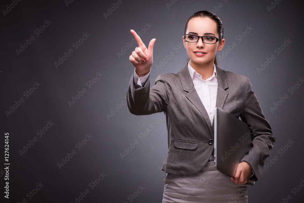 Businesswoman with laptop in business concept Businesswoman with laptop in business concept