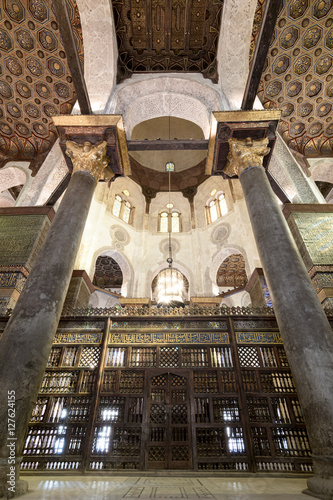 Interior view of mashrabiya screens around the cenotaph in the mausoleum of Sultan Qalawun, part of Sultan Qalawun Complex built in 1285 AD, located in Al Moez Street, Old Cairo, Egypt photo
