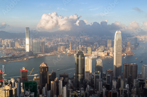 Skyscrapers and other buildings in Kowloon and Hong Kong Island in Hong Kong, China viewed from the Victoria Peak in daylight. © tuomaslehtinen