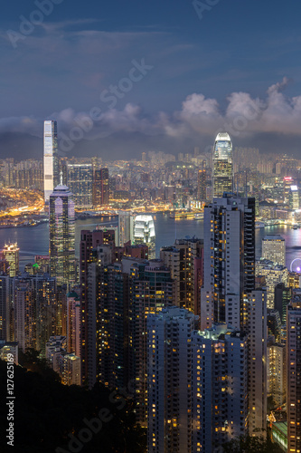 Hong Kong s famous skyline viewed from the Victoria Peak in the evening.