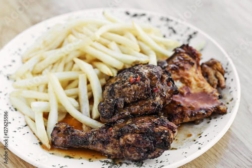 portuguese famous piri piri spicy bbq chicken with french fries