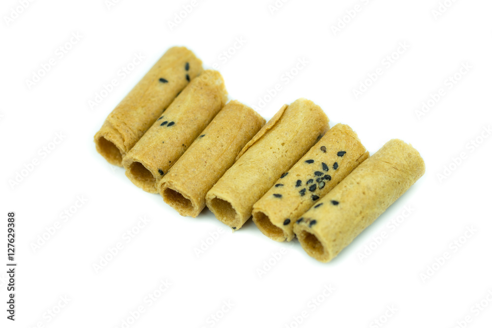 Coconut roll with black sesame Thai snack isolated on white back Coconut roll with black sesame Thai snack isolated on white back