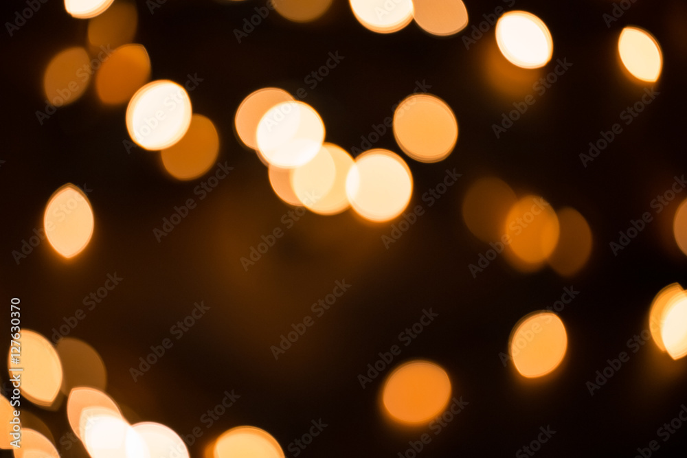 Defocused gold abstract Christmas Glitter Lights bokeh Background